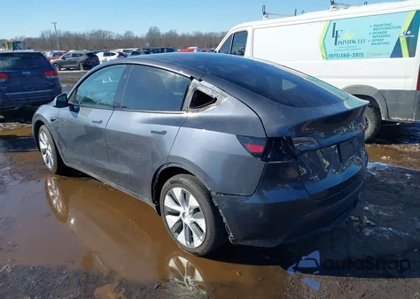 2023 Tesla Model Y Awd/Long Range Dual Motor All-Wheel Drive z USA, uszkodzony, nr VIN 7SAYGAEE4PF850527